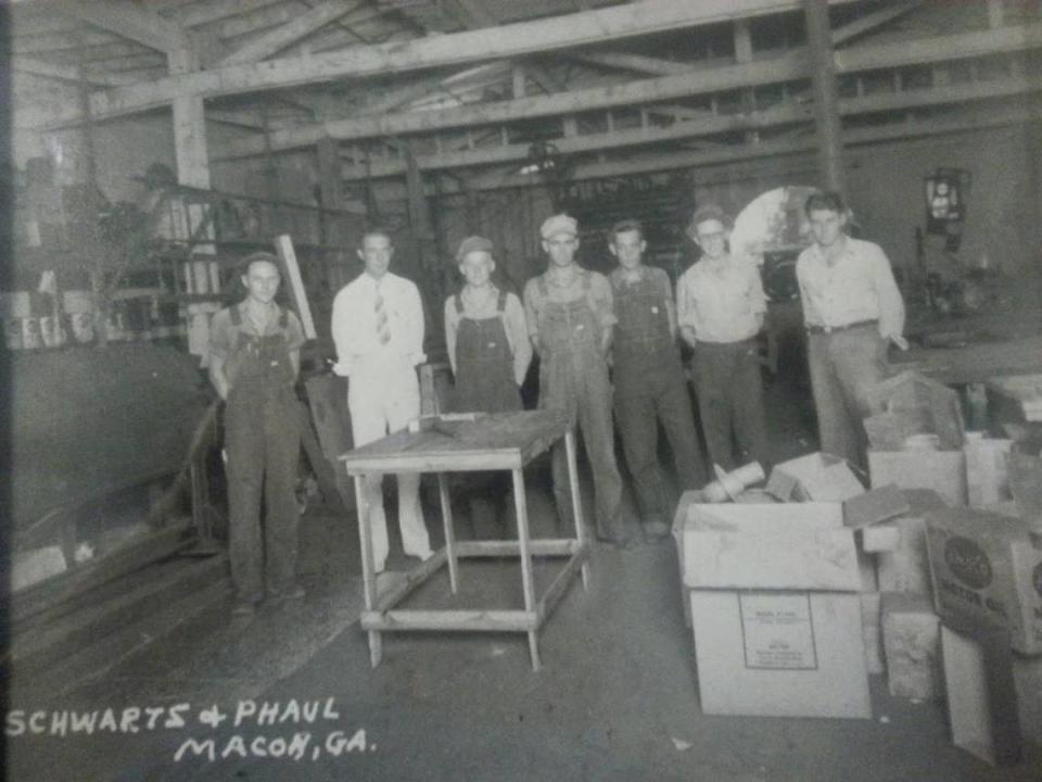 In a 1935 photo, employees and owners of L.E. Schwartz stand for a photo. The business recently celebrated 114 since opening in Macon. Courtesy Michael Kruger