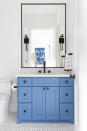 <p> If you have a minimalist bathroom decorated in a monochrome scheme, then your vanity offers the perfect opportunity to add more bathroom colors to your room. This beautiful cornflower blue vanity has a symmetrical design which suits the clean lines of the room, while also bringing color and character to the space. The vanity is accentuated with black brassware which ties the new piece in with the existing taps, door knob and light fixtures. </p>