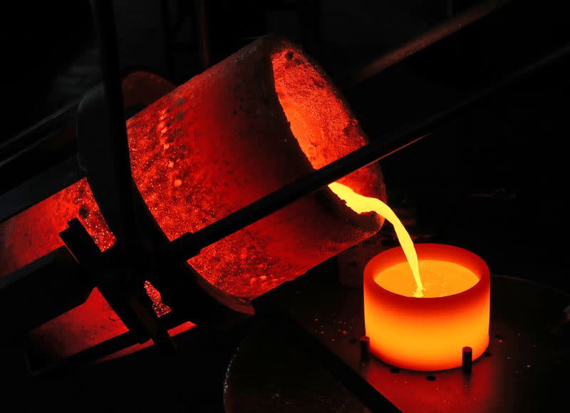 Liquid gold is poured to form grains at Swiss refinery Metalor in Marin