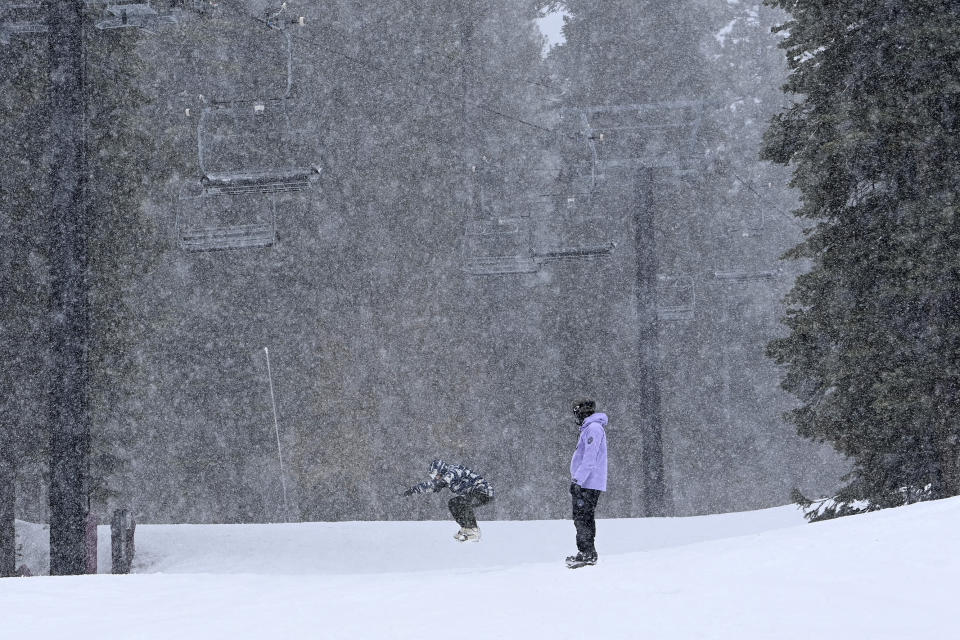 Skiers enjoy a day of skiing and snow fall at North Star California Resort on Thursday, Feb. 29, 2024, Truckee, Calif. The most powerful Pacific storm of the season started barreling into the Sierra Nevada on Thursday, packing multiple feet of snow and dangerous winds that forecasters say will create blizzard conditions likely to close major highways and trigger power outages into the weekend.(AP Photo/Andy Barron)