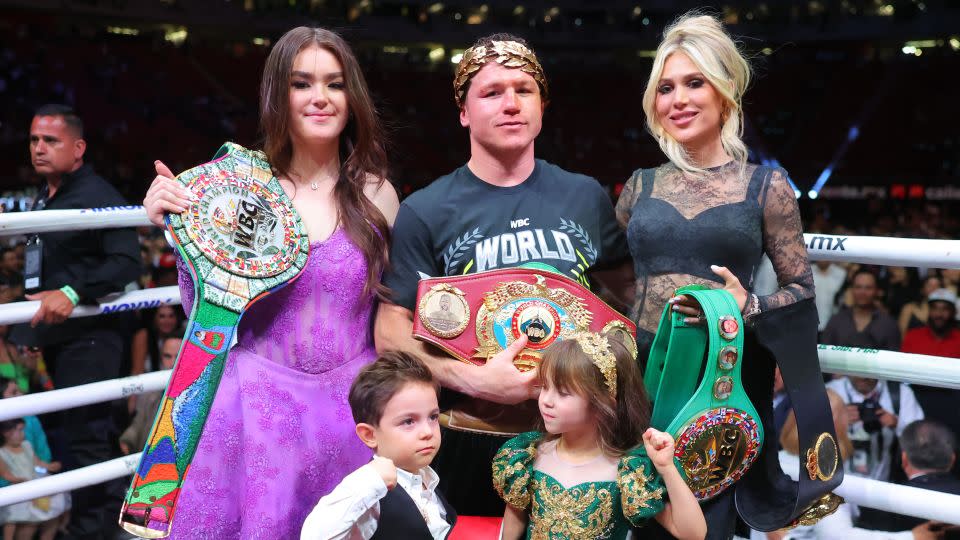 Álvarez celebrates with his family after his fight against Ryder. He defeated Ryder by unanimous decision. - Hector Vivas/Getty Images
