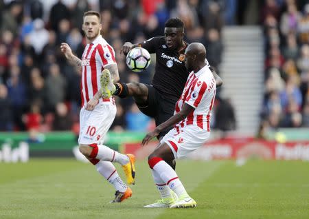 Britain Soccer Football - Stoke City v Hull City - Premier League - bet365 Stadium - 15/4/17 Hull City's Alfred N'Diaye in action with Stoke City's Bruno Martins Indi and Marko Arnautovic Action Images via Reuters / Carl Recine Livepic