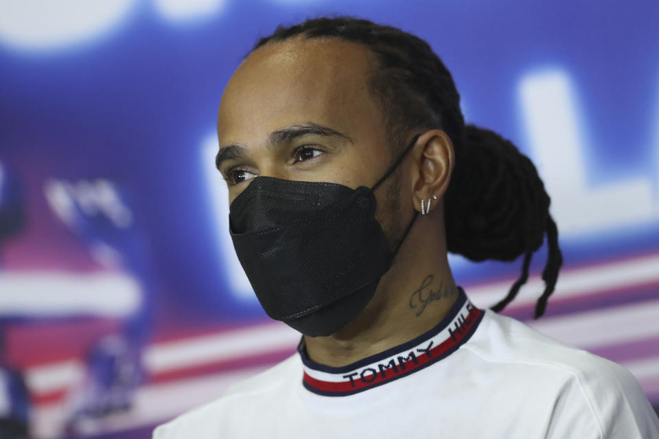 Lewis Hamilton, from Great Britain, attends a press conference ahead of this weekend's Mexican Grand Prix in Mexico City, Thursday, Nov. 4, 2021. (Edgard Garrido, Pool Photo via AP)