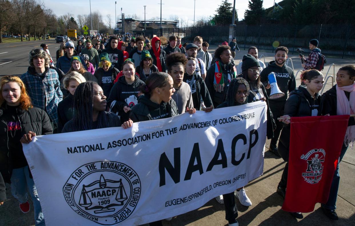 Students from the North Eugene Black Student Union lead the 2023 MLK March down Martin Luther King Jr. Blvd. in Eugene Monday, Jan. 16, 2023.