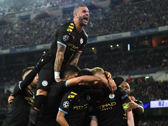 Manchester City celebrate after Kevin De Bruyne’s penalty (Getty)