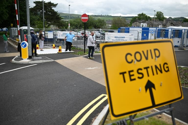 File d'attente pour se faire tester au Covid-19, à Kendal (Royaume-Uni), le 21 juin 2021 (photo d'illustration) - Oli SCARFF © 2019 AFP