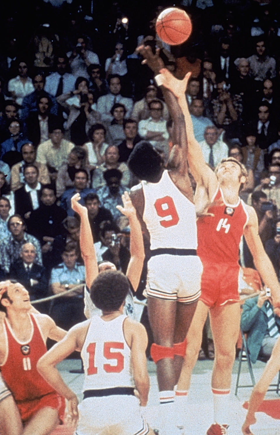 MUNICH, GERMANY - SEPTEMBER 10: USA Basketball team battles for the tip off against the Russia basketball team on September 10, 1972 in Munich, Germany. The Russia won this controversial game 51 to 50 after being given extra time to get a final shot off. It was the first loss in USA Basketball history. (Photo by Getty Images)