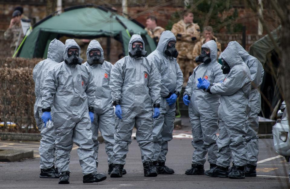 Military personnel wearing protective suits after the Novichok poisoning of Sergei Skripal (Getty Images)