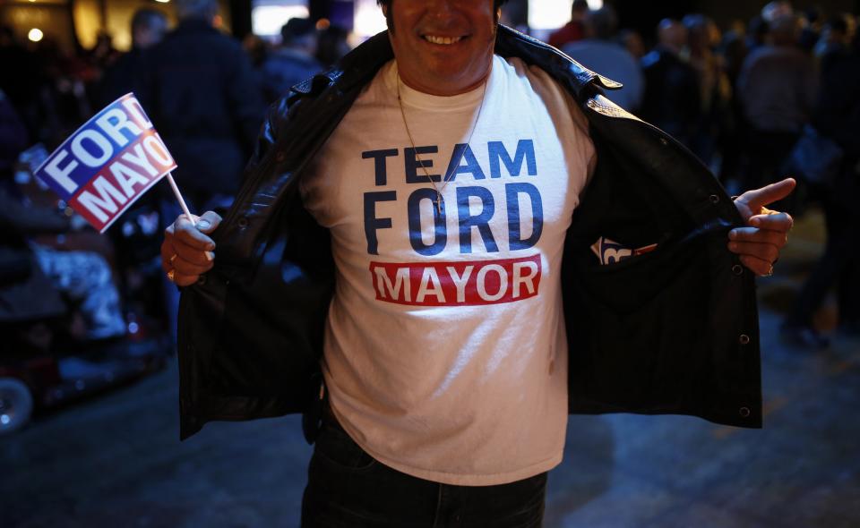 A man shows his Toronto Mayor Rob Ford T-shirt at Ford's campaign launch party in Toronto