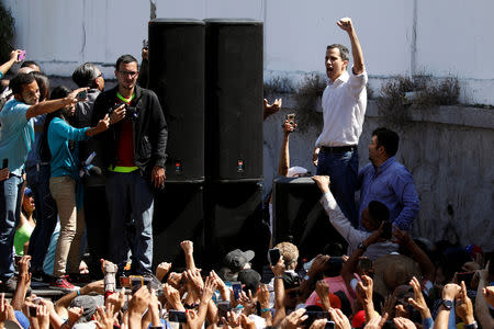 Juan Guaido, President of the Venezuelan National Assembly and lawmaker of the opposition party Popular Will (Voluntad Popular), greets supporters during a gathering in La Guaira, Venezuela January 13, 2019. REUTERS/Carlos Garcia Rawlins