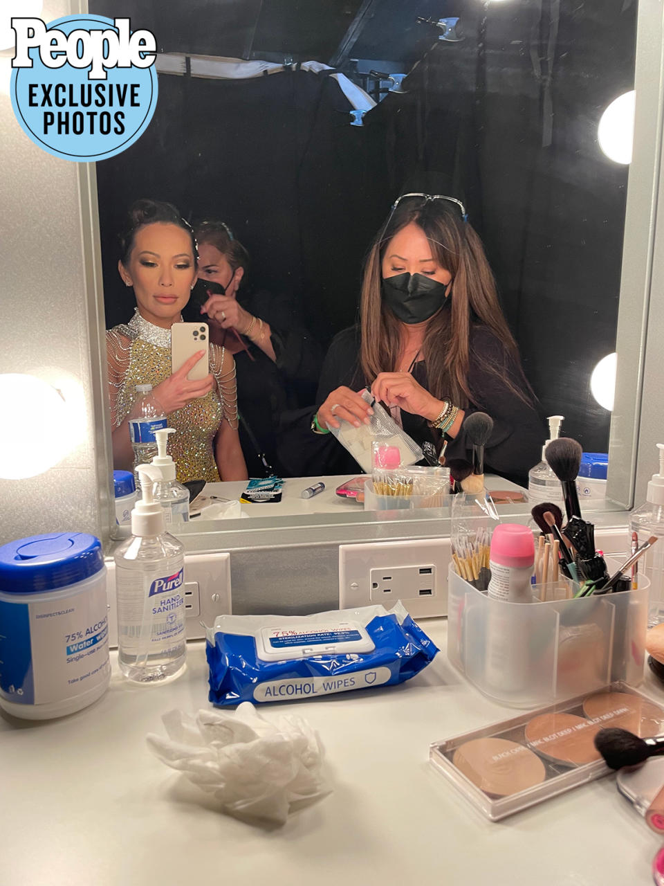<p>"Right before you go on stage, Eric Lam's team is set up for any last-minute touch-ups."</p>
