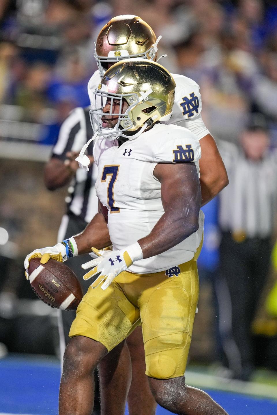 Sep 30, 2023; Durham, North Carolina, USA; Notre Dame Fighting Irish running back Audric Estime (7) runs for a score against the Duke Blue Devils during the first quarter at Wallace Wade Stadium. Mandatory Credit: Jim Dedmon-USA TODAY Sports