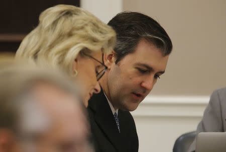 Former North Charleston Police Officer Michael Slager sits at the defense table during testimony in Slager's murder trial in Charleston, South Carolina, U.S. November 7, 2016, REUTERS/Grace Beahm/Pool