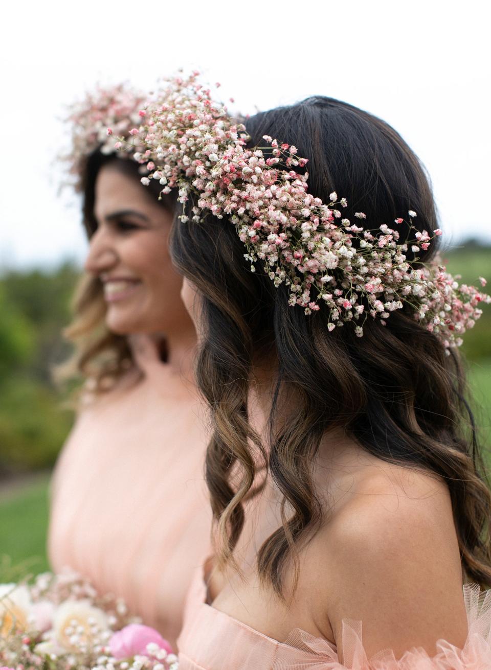 My baby’s breath bridesmaids Nicky Ahmadi and Julie Suhk in wearable bouquets by Kiana.