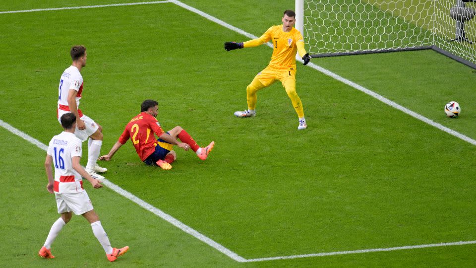 Carvajal slides in to give Spain a 3-0 lead. - Fabian Bimmer/Reuters