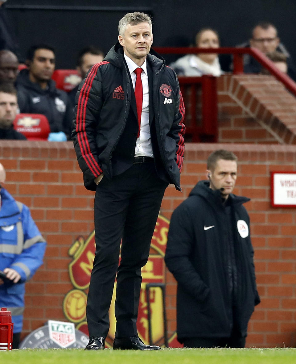 Manchester United interim manager Ole Gunnar Solskjaer watches the English Premier League soccer match against Huddersfield at Old Trafford, Manchester, England, Wednesday Dec. 26, 2018. (Martin Rickett/PA via AP)