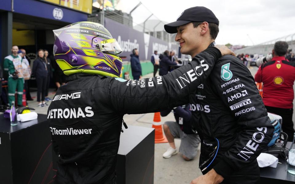 British Formula One driver Lewis Hamilton of Mercedes-AMG Petronas (L) pats teammate George Russell of after the qualifying session at the Formula One Grand Prix of Australia at the Albert Park Circuit in Melbourne, Australia, 01 April 2023 - Simon Baker/Shutterstock