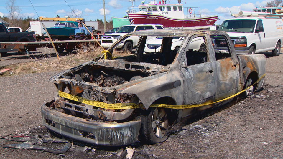 A vehicle was also burned in the fire.