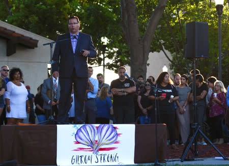 Mayor Ronald Velasco speaks at a vigil outside of Gilroy City Hall honoring those that died and were injured during a mass shooting at the Gilroy Garlic Festival