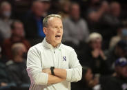 Northwestern head coach Chris Collins directs his team against Wake Forest in the first half of an NCAA college basketball game on Tuesday, Nov. 30, 2021, at the Joel Coliseum in Winston-Salem, N.C. (Allison Lee Isley/The Winston-Salem Journal via AP)