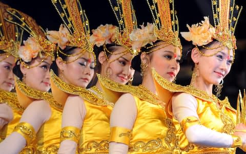 Dancers from the Central Ethnic Song and Dance Ensemble perform during a Chinese New Year celebration in Trafalgar Square, London - Credit: Fiona Hanson/PA Wire