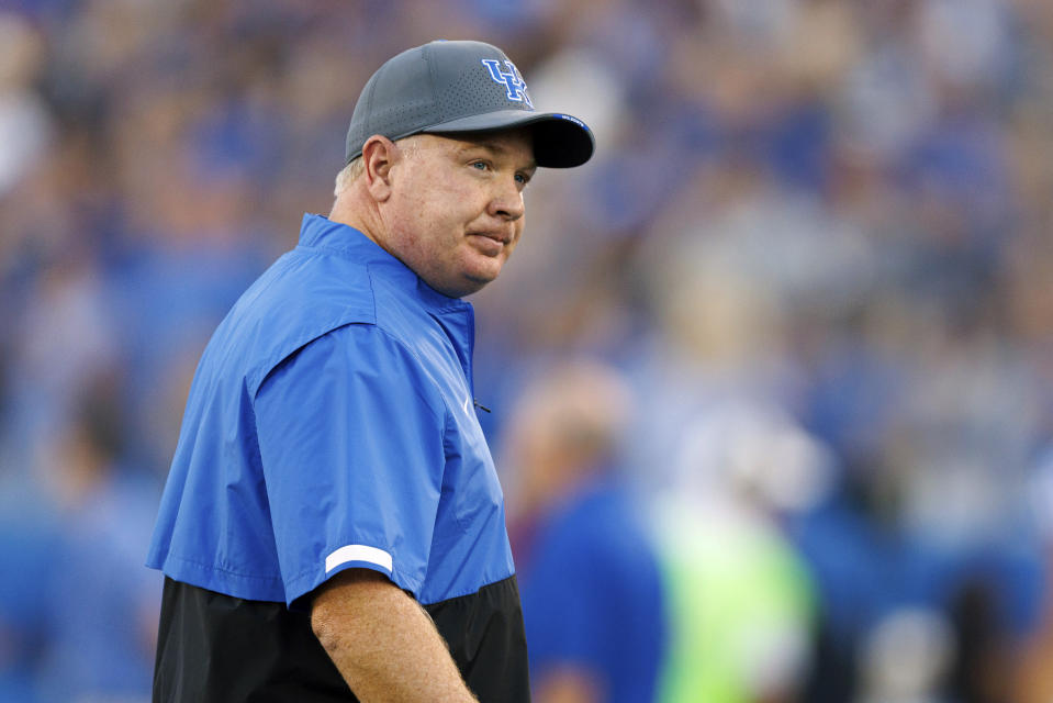 Kentucky head coach Mark Stoops walks onto the field before an NCAA college football game against Northern Illinois in Lexington, Ky., Saturday, Sept. 24, 2022. (AP Photo/Michael Clubb)