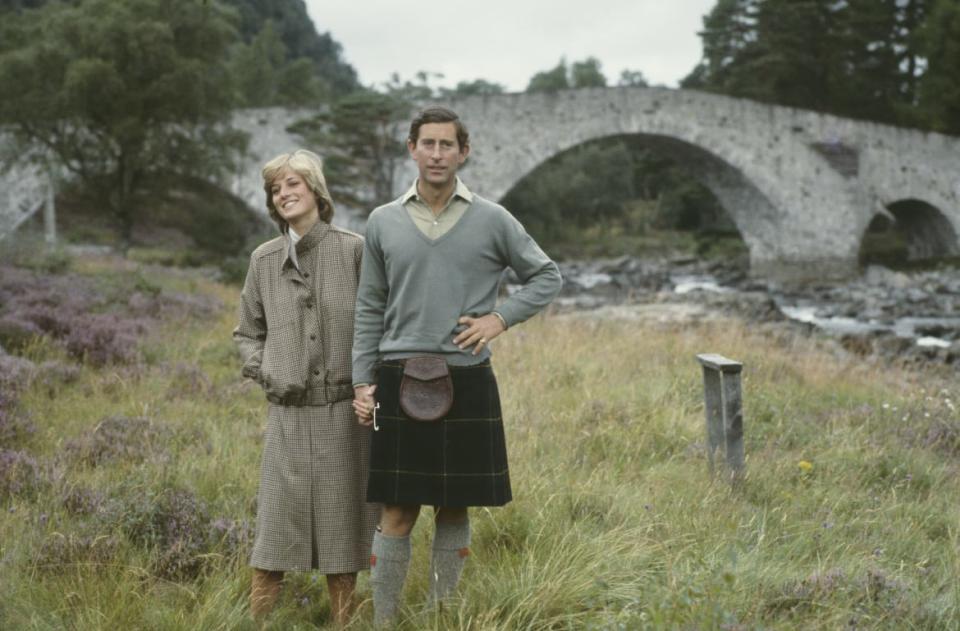 Princess Diana, left, and Prince Charles, on their honeymoon in Balmoral by the River Dee, August 1981.