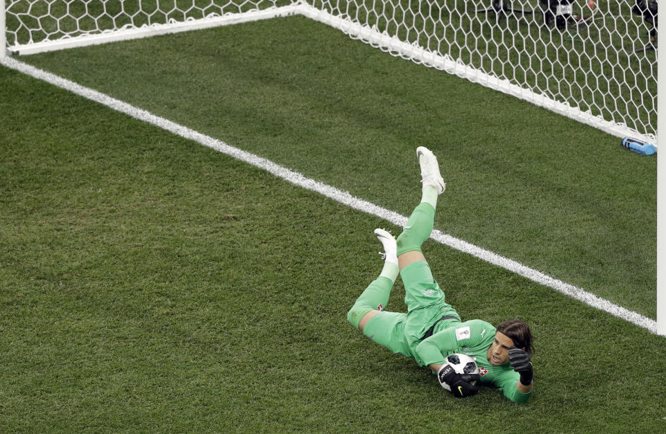 <p>Switzerland goalkeeper Yann Sommer dives for a save during the group E match between Switzerland and Costa Rica, at the 2018 soccer World Cup in the Nizhny Novgorod Stadium in Nizhny Novgorod , Russia, Wednesday, June 27, 2018. (AP Photo/Mark Baker) </p>