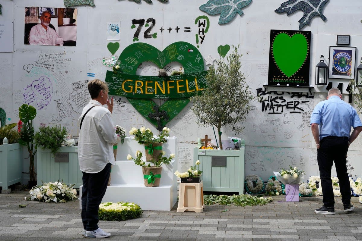 The Grenfell Tower memorial wall in North Kensington (AP)