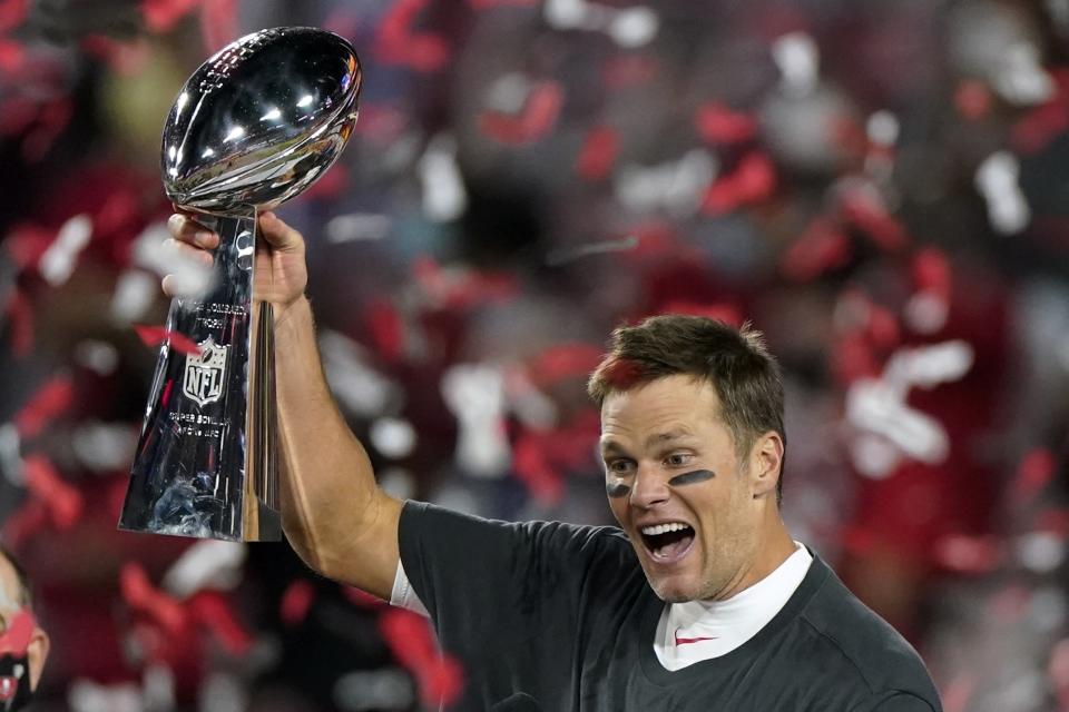 Tom Brady lifts the Lombardi Trophy after Super Bowl LV. (AP Photo/Gregory Bull)