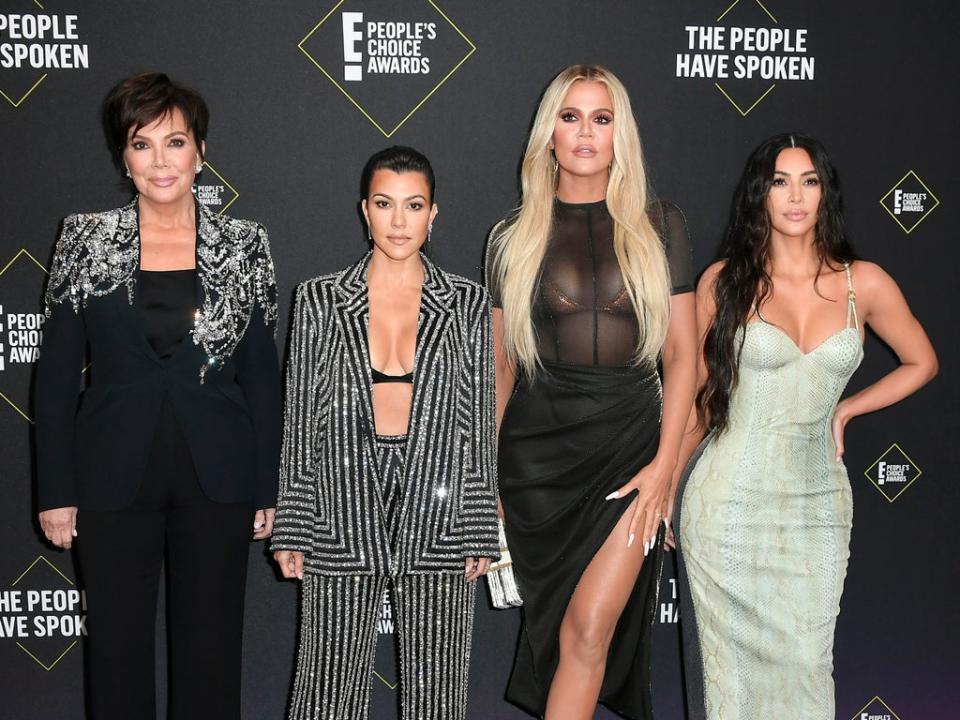 The sisters have faced much controversy, such as when Kim Kardashian recieved backlash for telling women in business to “get your f**ing ass up and work.” (Getty Images)