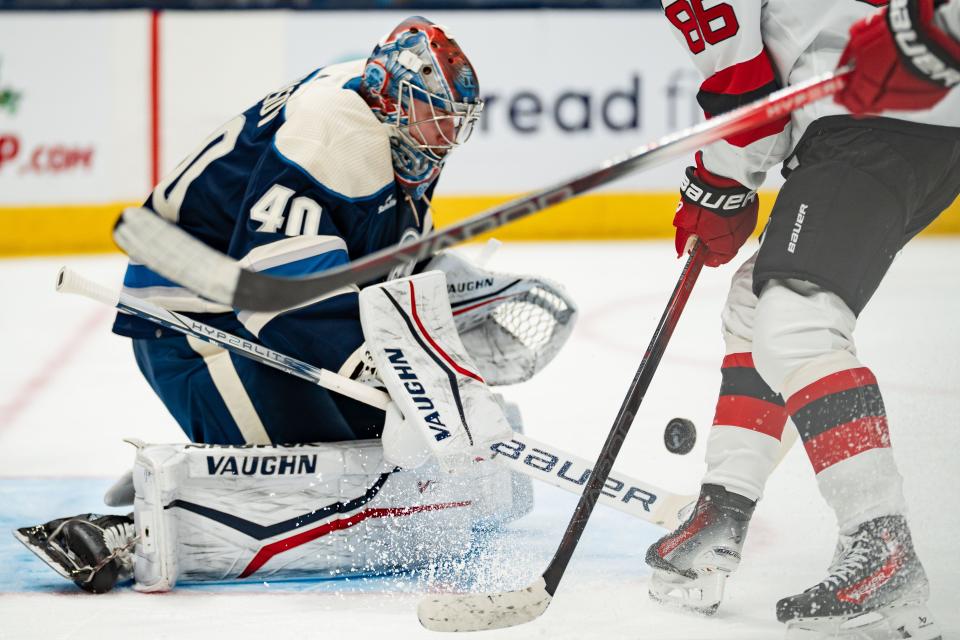 Dec 16, 2023; Columbus, Ohio, USA;
Columbus Blue Jackets goaltender Daniil Tarasov (40) blocks a goal shot by the New Jersey Devils during the second period of their game on Saturday, Dec. 16, 2023 at Nationwide Arena.