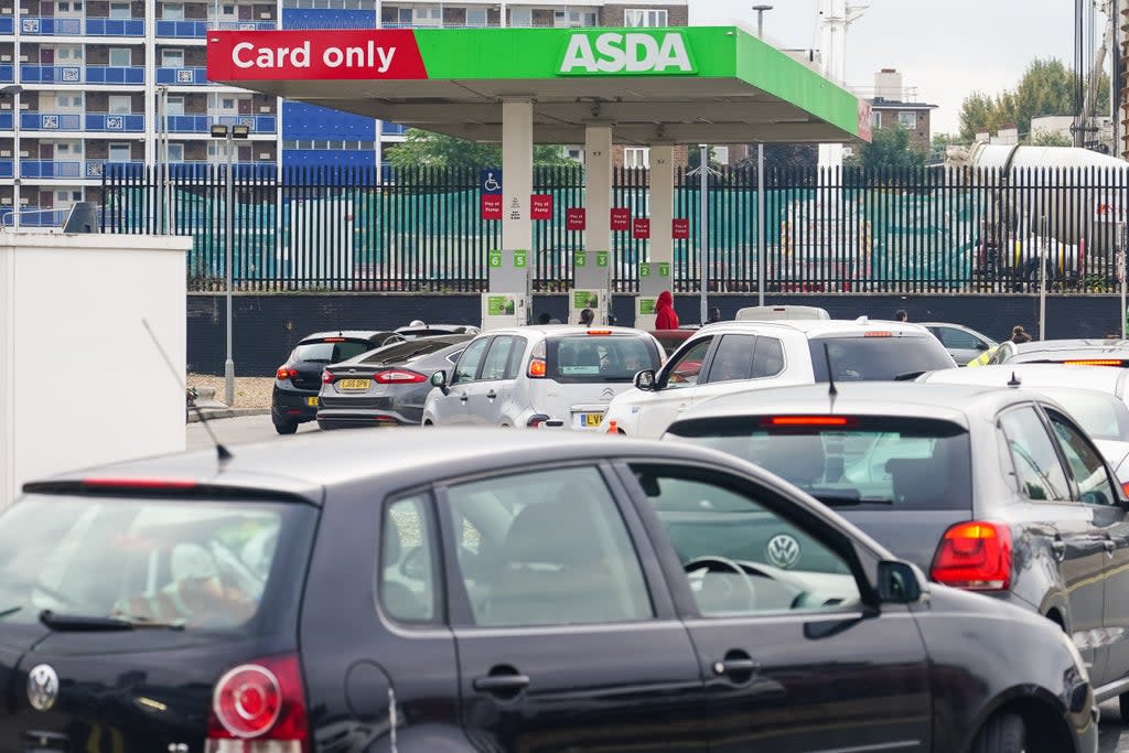 Cars queue for fuel at an Asda petrol station in south London amid continued panic buying (Dominic Lipinski/PA) (PA Wire)