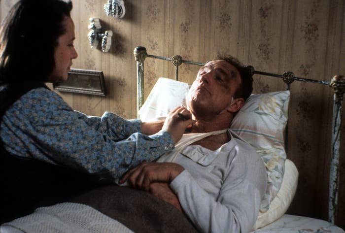 Annie shaving Paul in bed in "Misery"