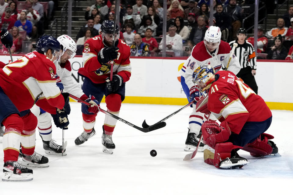 Florida Panthers goaltender Anthony Stolarz (41) watches the puck during the first period of the team's NHL hockey game against the Montreal Canadiens, Thursday, Feb. 29, 2024, in Sunrise, Fla. (AP Photo/Lynne Sladky)