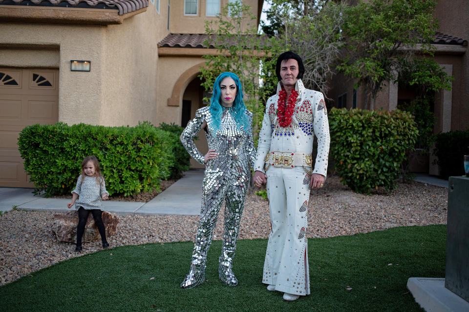 Tierney Allen, 33, Lady Gaga Impersonator, Travis Allen, 42, Elvis Impersonator, and their daughter Charlotte, 3, Las Vegas. The couple is two of more than 80,000 gig workers in Las Vegas who are now unable to make a living. | Daniella Zalcman for TIME