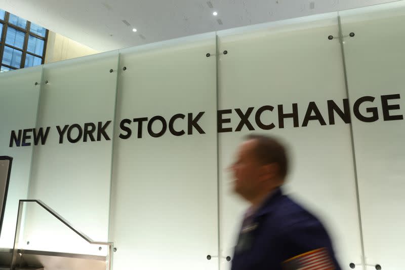 A trader works on the trading floor at the New York Stock Exchange (NYSE) in Manhattan, New York City