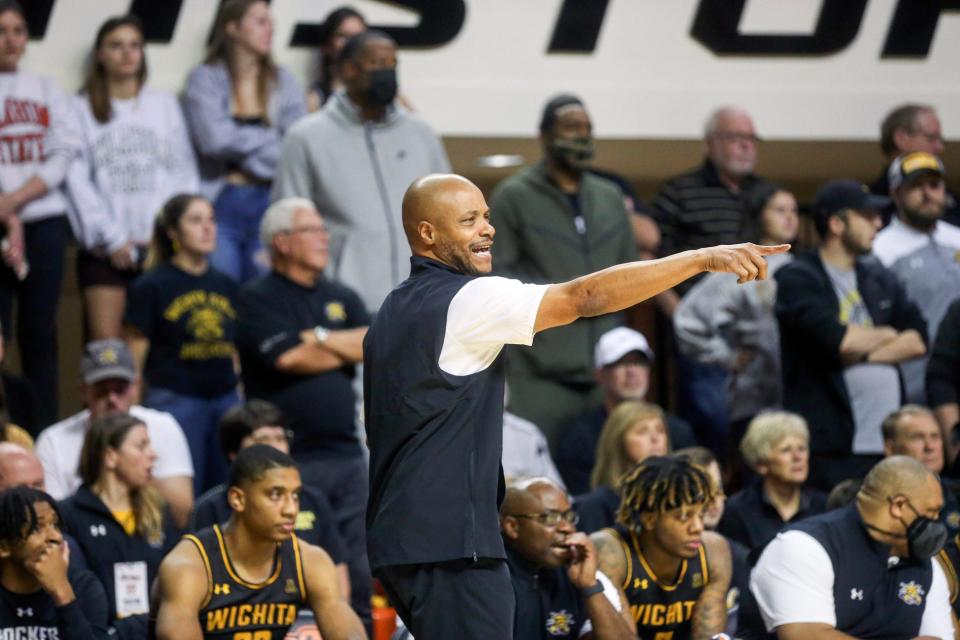 Wichita State head coach Isaac Brown yells out a play to his players against Oklahoma State Wednesday in Stillwater, Okla. (Ian Maule/Tulsa World via AP)