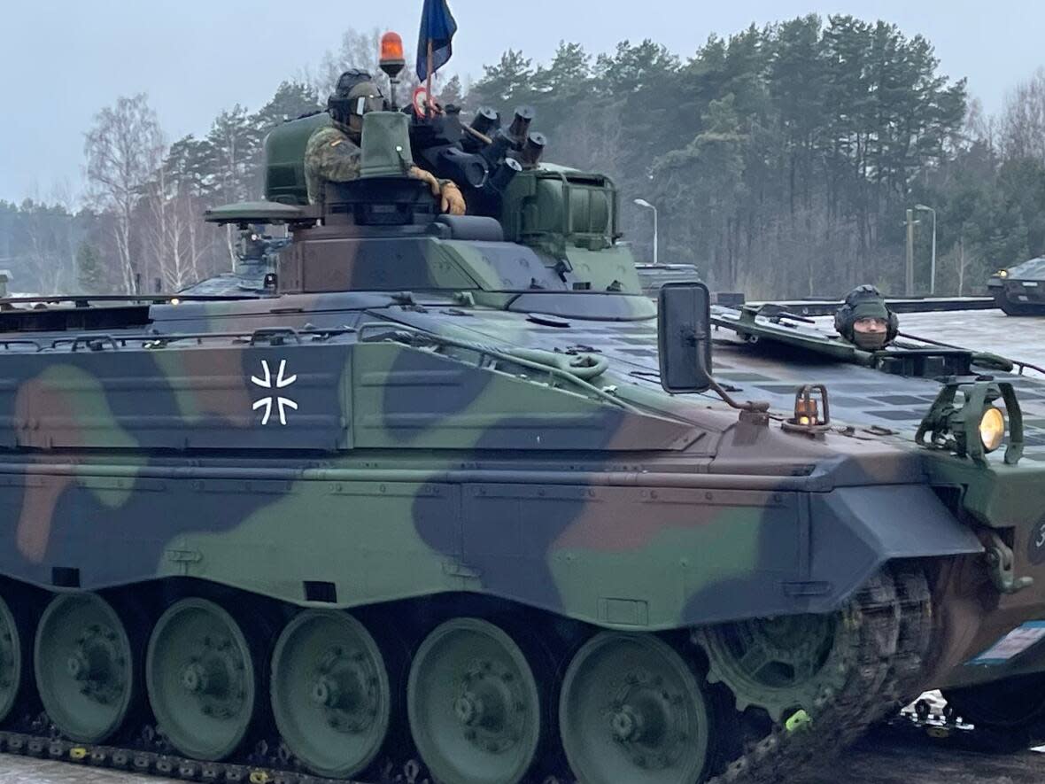 A German armoured personnel carrier and its crew arrives in Rukla, Lithuania, at the start of a six-month assignment in the Baltic nation. (Chris Brown/CBC - image credit)