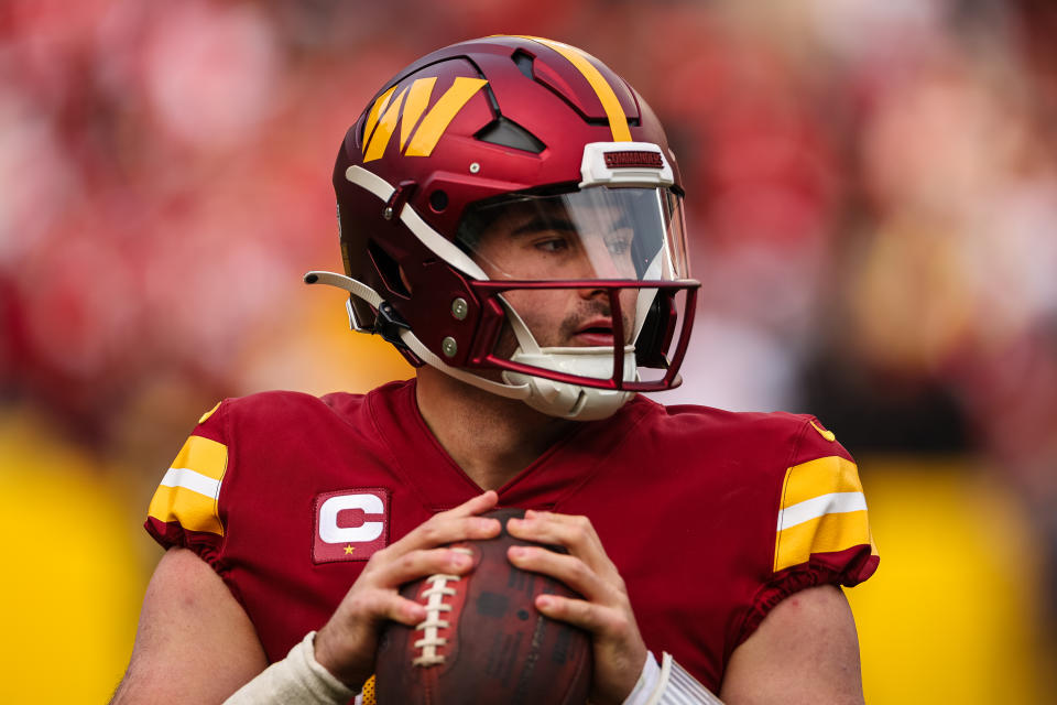 LANDOVER, MD - DECEMBER 31: Sam Howell #14 of the Washington Commanders looks on against the San Francisco 49ers during the second half of the game at FedExField on December 31, 2023 in Landover, Maryland. (Photo by Scott Taetsch/Getty Images)