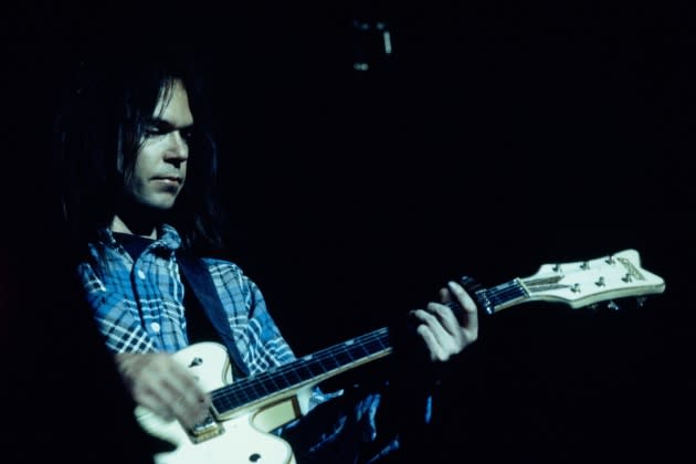 Neil Young performs in Paris, France on March 23rd , 1976. - Credit: Gamma-Rapho via Getty Images