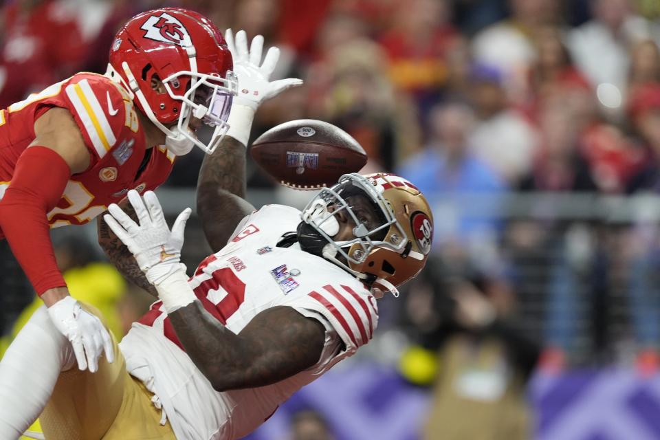 San Francisco 49ers wide receiver Deebo Samuel (19) misses the catch against Kansas City Chiefs cornerback Trent McDuffie (22) during the first half of the NFL Super Bowl 58 football game Sunday, Feb. 11, 2024, in Las Vegas. (AP Photo/George Walker IV)