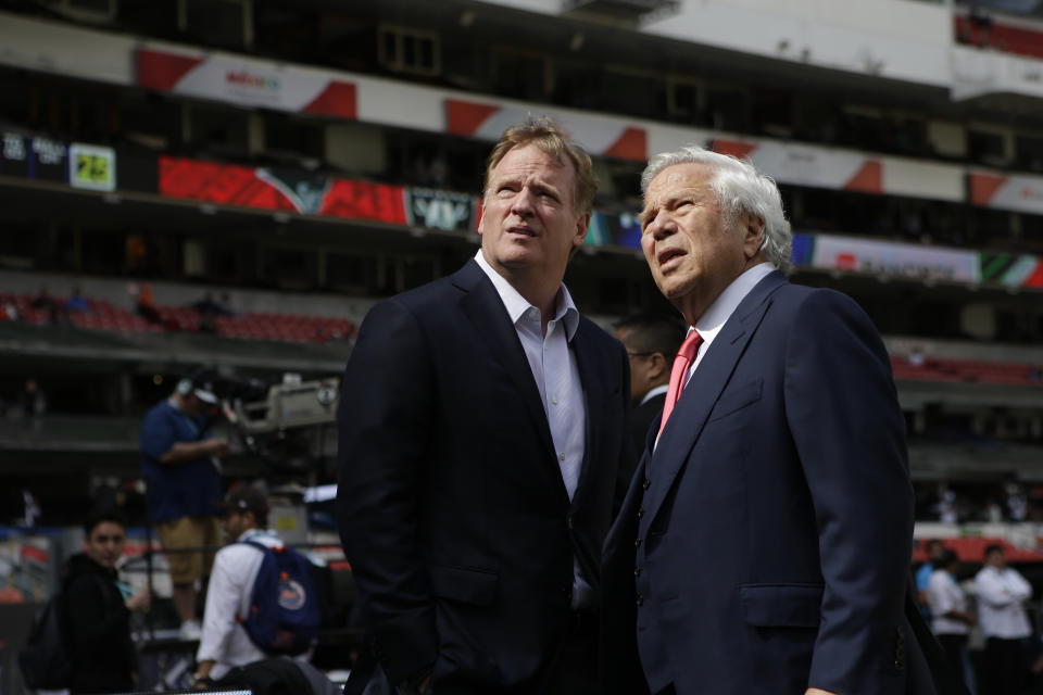 NFL Commissioner Roger Goodell, left, talks with New England Patriots owner Robert Kraft before the Patriots face the Oakland Raiders in an NFL football game Sunday, Nov. 19, 2017, in Mexico City. (AP Photo/Rebecca Blackwell)