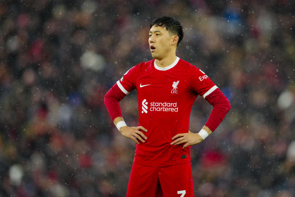 Liverpool's Wataru Endo reacts during the English Premier League soccer match between Liverpool and Newcastle, at Anfield stadium in Liverpool, England, Monday, Jan. 1, 2024. (AP Photo/Jon Super)