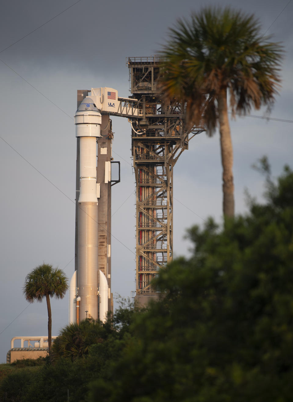 A United Launch Alliance Atlas V rocket that will launch Boeing's CST-100 Starliner spacecraft to the International Space Station stands ready on launch complex 41 at the Cape Canaveral Space Force Station in Cape Canaveral, Fla., on Thursday, May 19, 2022. (Joel Kowsky/NASA via AP)