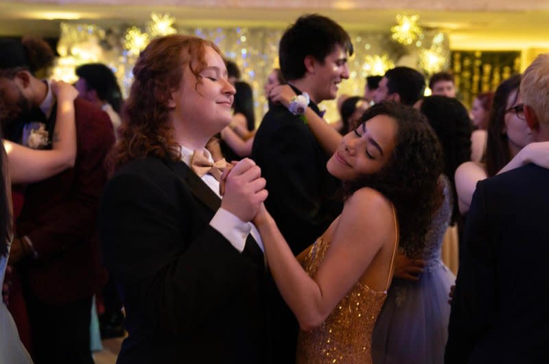Julia Lester (L) and Antonia Gentry dance at prom. Photo courtesy of Disney