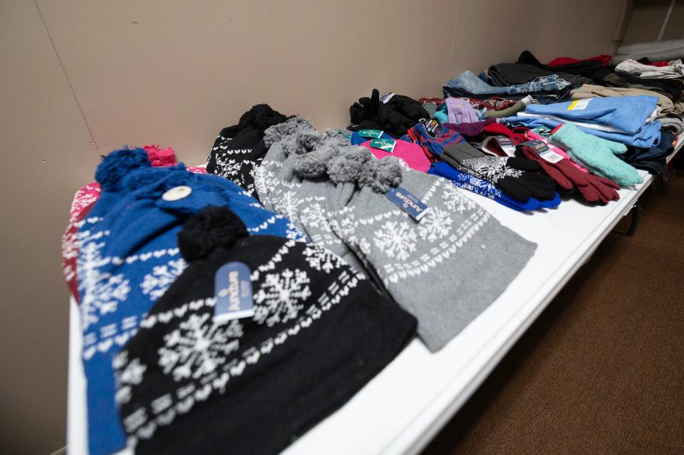 Warm weather gear for local youth are laid out on a table at Halfway Home Pueblo located at 803 W. Fourth St. A toy drive will be held at the organization's office on Dec. 22, 2021.