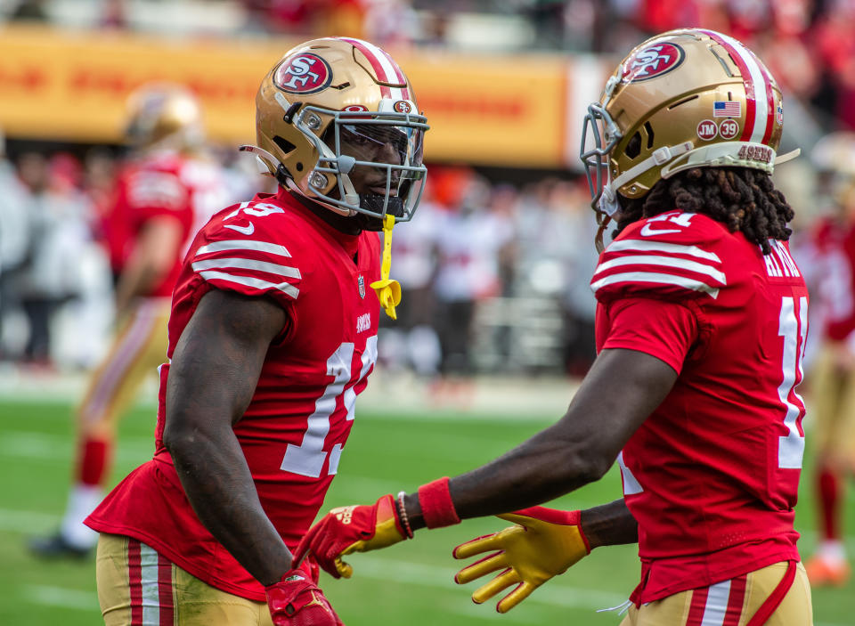 San Francisco 49ers wide receiver Deebo Samuel (19) celebrates his touchdown with wide receiver Brandon Aiyuk (11)