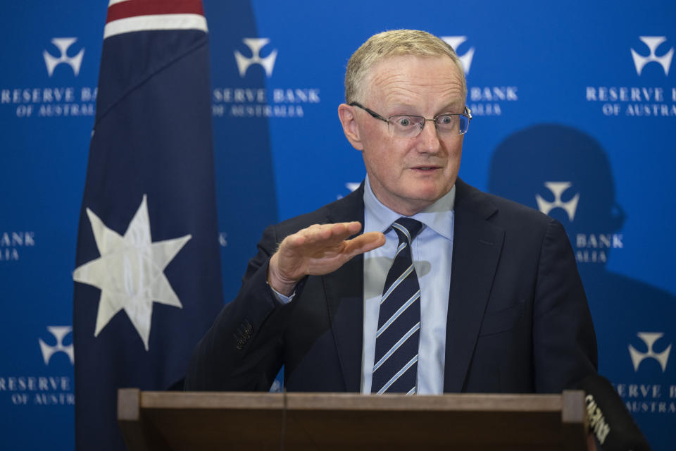 Governor of the Reserve Bank of Australia Philip Lowe gestures during a press conference.