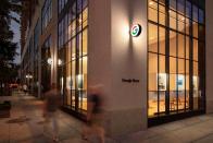 <p>Google Store Chelsea. Exterior facade at night with blurs of two people walking by.</p> 